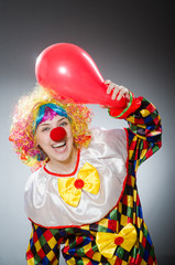Funny clown in comical concept