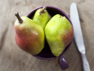 pears in a porcelain dish