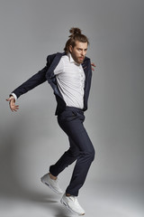 Handsome stylish guy wearing suit