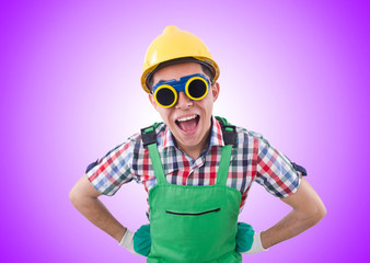Funny construction worker isolated on white