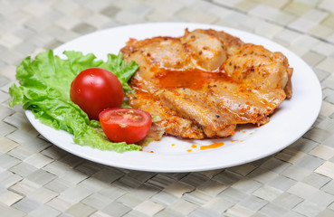 Chicken fillet in spicy sauce with vegetables