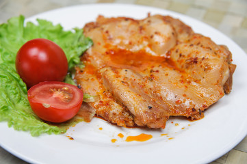 Chicken fillet in spicy sauce with vegetables