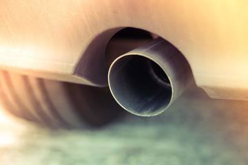 Car pipe exhaust muffler rejecting carbon dioxide, slide leak vintage style