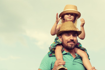 Happy father and daughter having fun together, family time concept