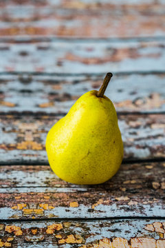 Pear on rustic old background