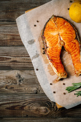 Grilled salmon on wooden table
