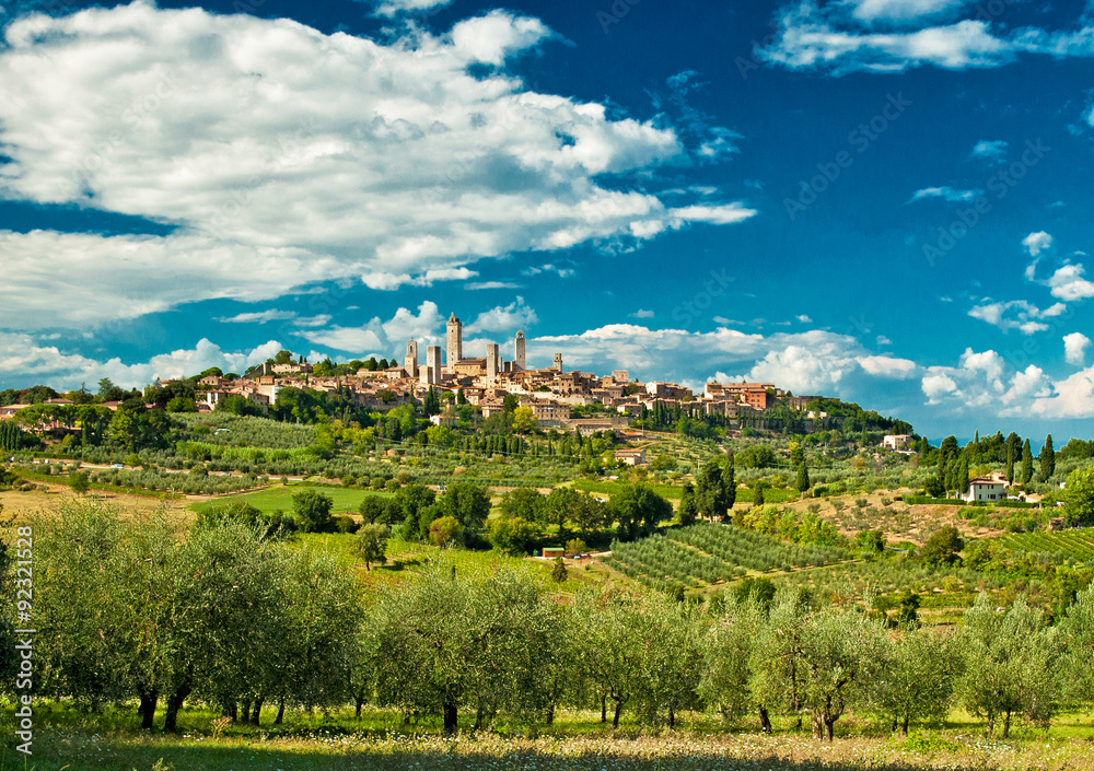 Wall mural panoramic view on san gimignano with vineyards, one of the nicest villages of italy