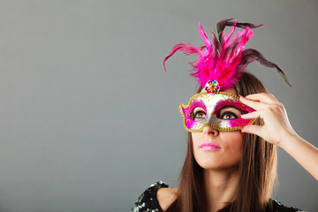 woman face with carnival mask