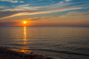 Fototapeta na wymiar Ocean beach at sunset