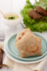 burrito wraps or tortilla wrapped with meat and beans and served