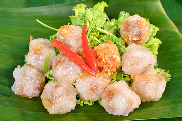 Thai dessert kanom sago on banana leaf 