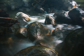 Fototapeta premium Klong Pla Kang waterfall.Located in Khao Chamao - Khao Wong A large waterfall cascades approximately three kilometers in length throughout the second side is pure virgin forest. Thailand.