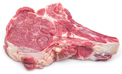 Raw beef steaks on a white background.