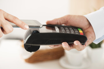 paying with NFC technology on mobile phone
