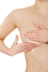 Fototapeta premium Woman examining breast.