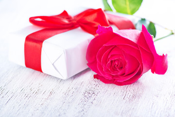 present and red rose