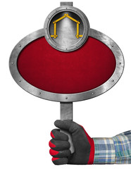 Metal Sign for Construction Industry / Hand with work glove holding a oval metal sign with a meter ruler in the shape of house. Empty sign for the construction industry, isolated on white