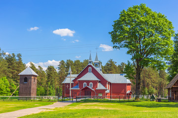 Wooden church at countryside green tree village rural