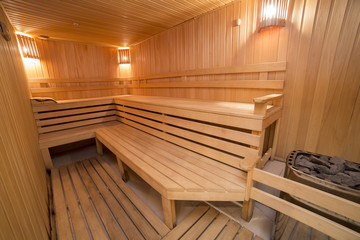 Fototapeta na wymiar Sauna interior comfortable wooden room spa indoors