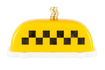 taxi sign with gold coins  isolated on a white background