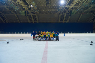 ice hockey players team meeting with trainer