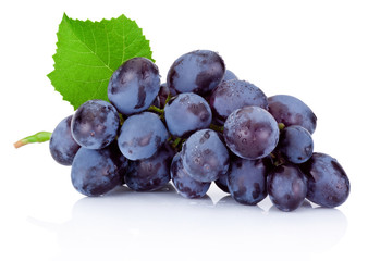 Fresh wet blue grapes with green leaf isolated on white backgrou