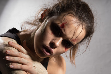 Naklejka premium Angry woman with wounds on his face