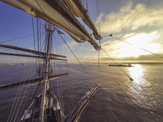 Sunrise on a square rigged sailing ship.