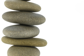 Fototapeta na wymiar Sea stones stacked tower symbolizing balance