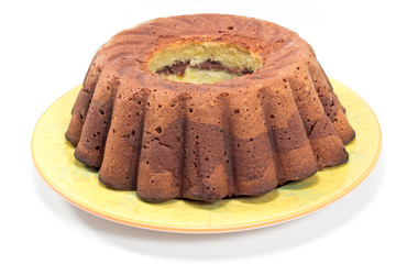 Chocolate and vanilla marble cake isolated on white