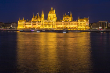 Fototapeta na wymiar Evening view over river to Parliament house, Budapest, Hungary, Europe