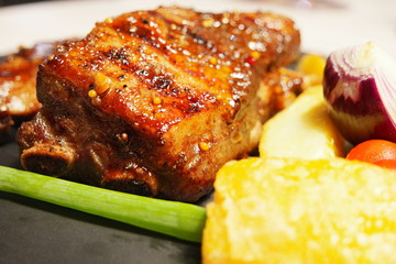 Grilled pork ribs and vegetables