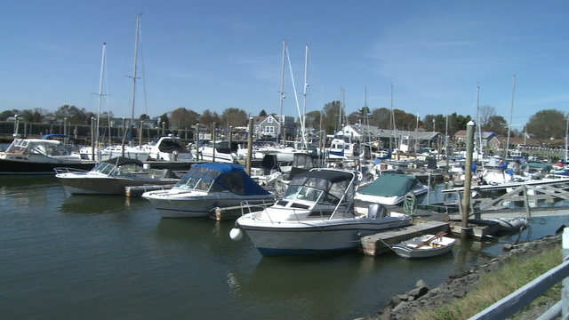 Motor boats docked at marina