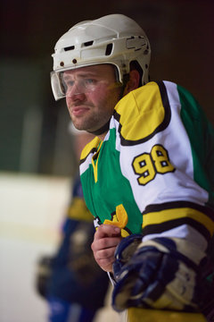 ice hockey players on bench