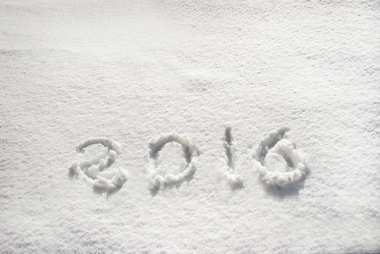 2016 written in snow, holiday background