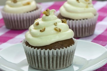 Carrot CupCake with Cream Cheese Icing and sprinkle walnut on top