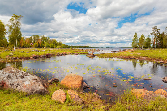 Swedish lake with rocks in summer