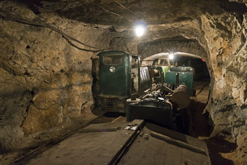 Underground tunnel of Limestone mine with train and locomotive in Bohemia, Czech Republic