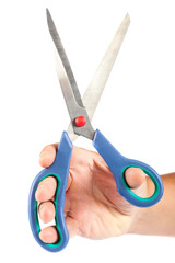 Scissors in hand on white background.