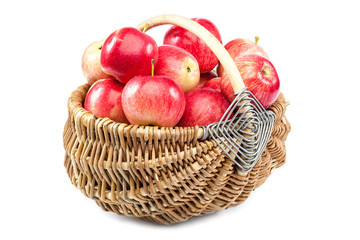 Fresh apples in a wicker basket.
