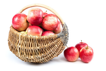 Fresh apples in a wicker basket.