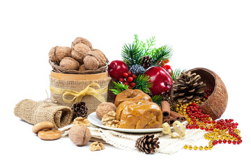 Baked apples with nuts and cinnamon. Christmas decorations.