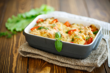 Cauliflower baked with  tomatoes
