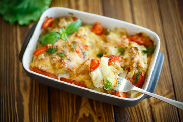 Cauliflower baked with  tomatoes