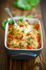 Cauliflower baked with  tomatoes