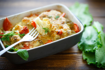Cauliflower baked with  tomatoes