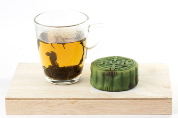 Moon cake with Matcha and cup of Tea