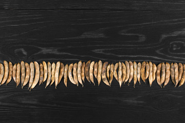 Soybeans pod, harvest of soy beans background Soybeans on a wooden background. rustic style