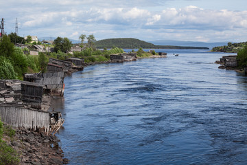 Watercourse to the White Sea in Knyazhaya Guba in Kandalakshskiy District of Murmansk Oblast, Russia. The village is located beyond the Arctic circle, on the Kola Peninsula.