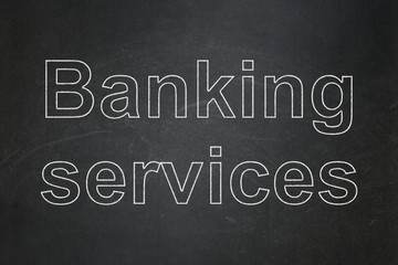 Fototapeta premium Money concept: Banking Services on chalkboard background
